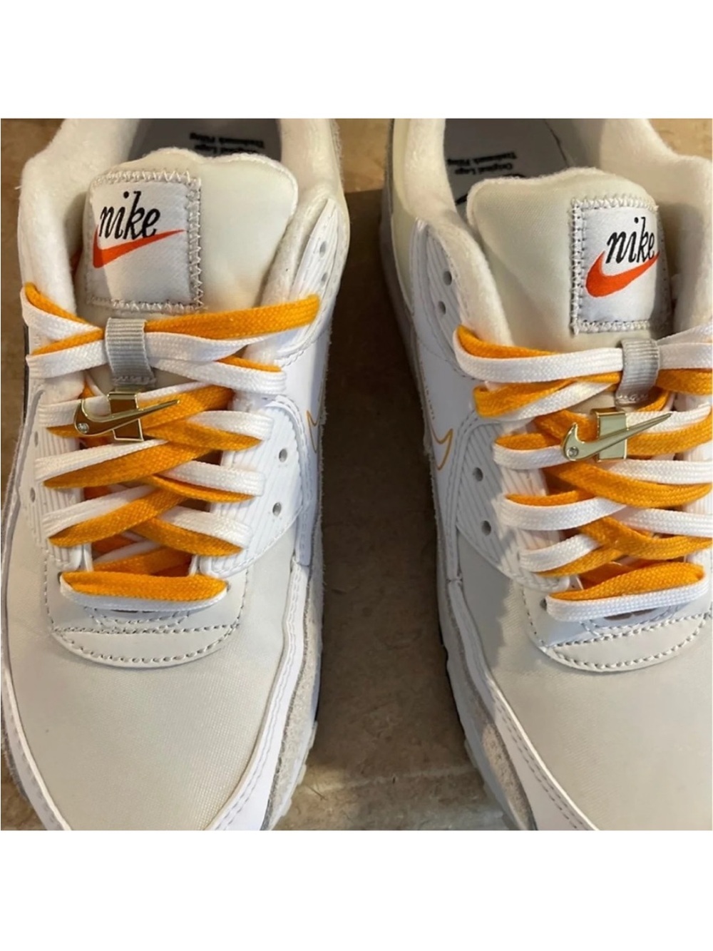 Nike White Low-Top Sneakers with Orange Accents